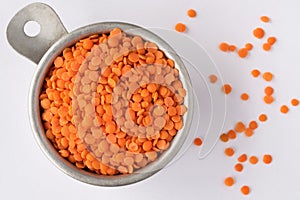 Uncooked Red Lentils in a Measuring Cup