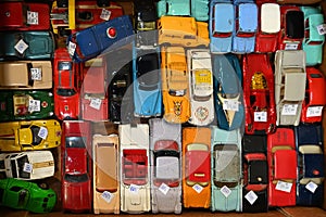 Close up view of vintage battered car toy bunch