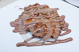 Close up view of waffle with chocolate nutella