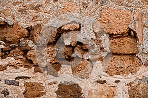 Close-up view of wall fragment with coarse shell rock masonry