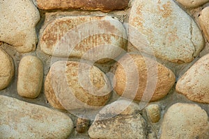 close-up view of weathered stone wall texture full frame background