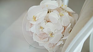 Close up view on wedding bouquet with delicate pink flowers. Elegant beautiful bridal posy. Wedding symbol. Slow motion