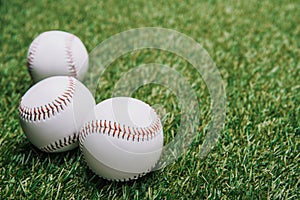 close up view of white baseball balls