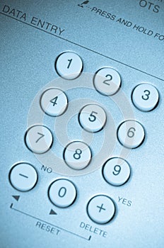 Close up view of white buttons blue toned