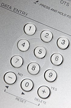 Close up view of white buttons on silver