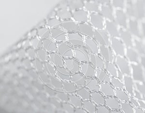 Close Up View of White Mesh Netting Texture with Abstract Hexagonal Pattern