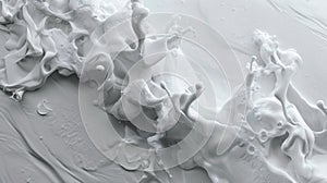 Close-Up View of White Paint Splashes and Swirls Capturing Dynamic Movement