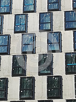 Close-up view of windows and concrete on a building under construction