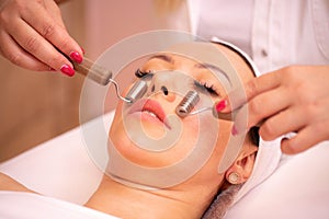 Close up view of a woman getting a facial massage