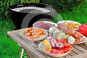 Close-up View On Wood Picnic Table With Different Cookout Food