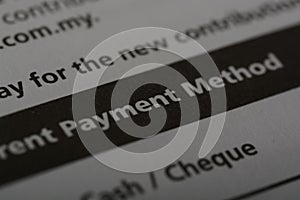 Close up view of the word PAYMENT METHOD. A payment option refers to a method or choice available to individuals or entities for