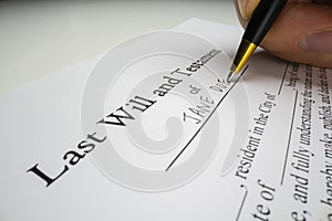 Close-up view of writing a last will