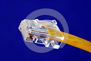 Close-up view of the yellow Ethernet (RJ45) cable