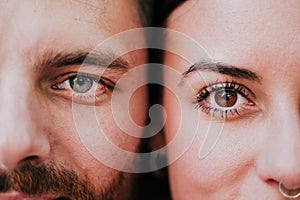 Close up view of young happy couple together. Eyes close up. Love and family concept