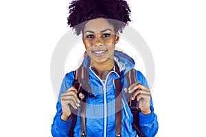 Close up view of a young woman with camera and backpack