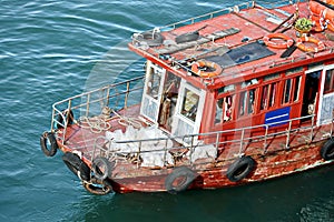 Close-up views of equipments, constructions of  vessel, barges, tugboats and small boats at the roadstead of Halong bay. Port of C