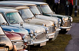 Close up of vintage cars on street