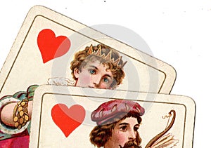 Close up of a vintage jack and queen of hearts playing cards.