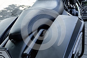 Close up of Vintage motorcycle parking on the road. Croped view