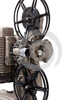 Close-up of a vintage movie projector on a white background