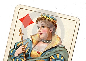 Close up of a vintage queen of diamonds playing card.