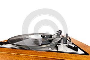 Close up of vintage turntable vinyl record player isolated on white