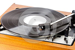 Close up of vintage turntable vinyl record player isolated on white