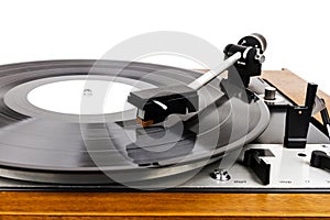 Close up of vintage turntable vinyl record player isolated on white