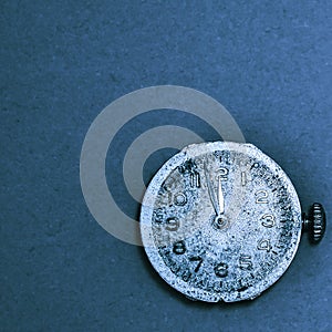 Close-up of vintage watches on empty background. the clock shows three minutes to midnight. the new day coming concept. with