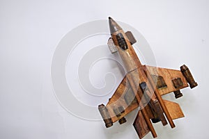 Close up Vintage wooden airplane toy made from bamboo. Isolated on white background