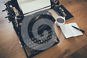 Close up of vintage writers desk with typewriter