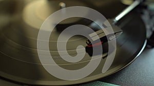 Close up of vinyl record on player