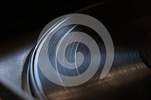 Close-up of vinyl record on a turntable