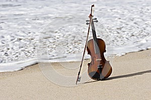 Close up of a Violin and the Atlantic Seashore