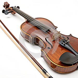 Violin and bow closeup isolated on white background photo