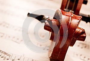 Close Up of Violin Scroll and Bow