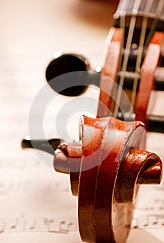 Close Up of Violin Scroll and Bow