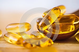 Close up the vitamin D and Omega 3 fish oil capsules supplement