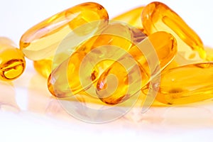 Close up the vitamin D and Omega 3 fish oil capsules supplement