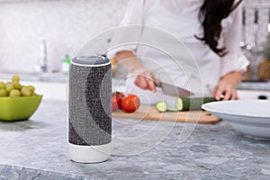 Close-up Of Voice Assistant Speaker On Kitchen Counter