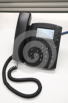 Close up of and VOIP office desk phone