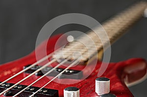 Close-up volume control of bass guitar