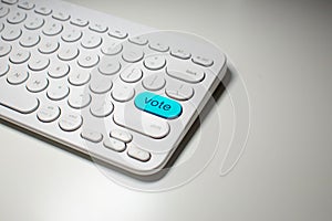 Close up of a Vote button on a keyboard. Conceptual
