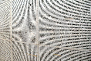 Close up of wall engraved with names of Holocaust victims, Memorial De La Shoah, Paris, France, 2016