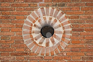 Close up of a wall made of orange bricks