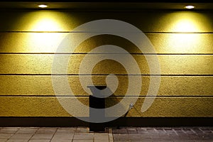 Wall spotlight throws light cones