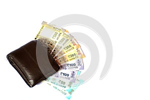 Close up of wallet with Indian rupees