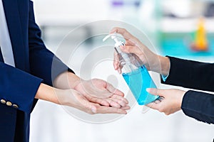 Close-up washing hands with alcohol gel or antibacterial soap sanitizer . Hygiene concept. prevent the spread of germs and