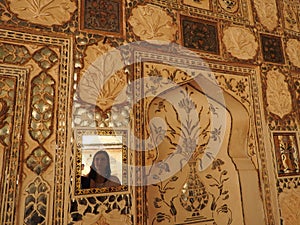 Close up of a wasp nest hanging from the ceiling of a building at outdoors, in Amber Fort near Jaipur, Rajasthan, India