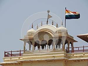 Close up of a wasp nest hanging from the ceiling of a building at outdoors, in Amber Fort near Jaipur, Rajasthan, India